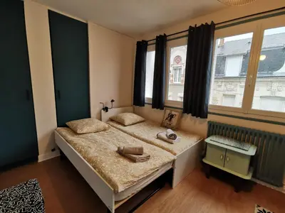 Un ou plusieurs lits dans un hébergement de l'établissement Grand Appartement Familial, Tours Centre, Parking