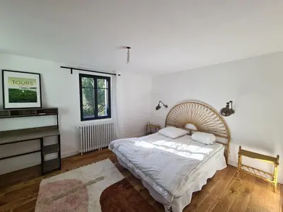Un ou plusieurs lits dans un hébergement de l'établissement Gite Au Coeur de Tours, familial avec jardin au calme, parking