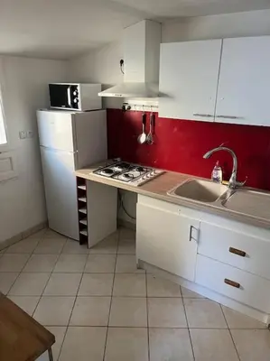 Cuisine ou kitchenette dans l'établissement Le logis des roses